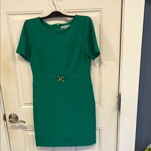 Elegant Green Dress with Gold Accent